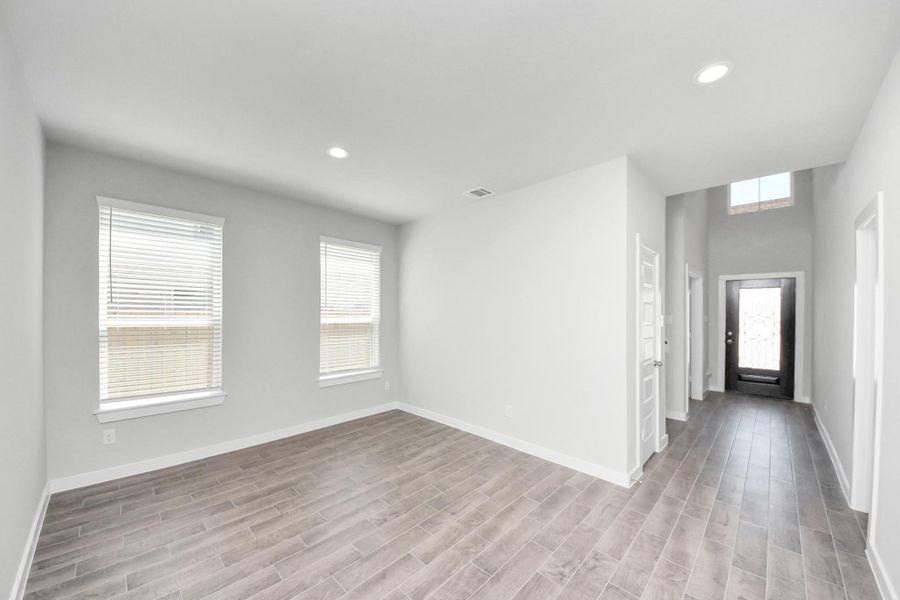 Make memories gathered around the table with your family and friends! This spacious dining room features elegant flooring, custom paint, and adjacent to family room and kitchen for open concept feel. Make memories gathered around the table with your family and friends! This spacious dining room features elegant flooring, custom paint, and adjacent to family room and kitchen for open concept feel.