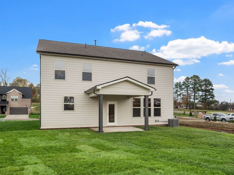 Exterior details and patio area of a home in Woods Crossing, Gallatin (Image 26).