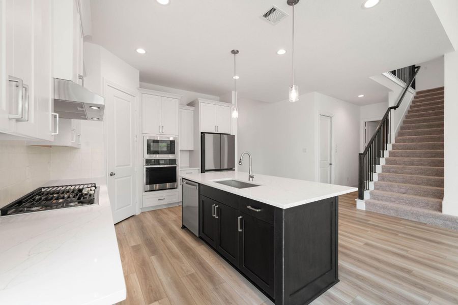 This home is move in ready! You don't even need to bring a fridge!