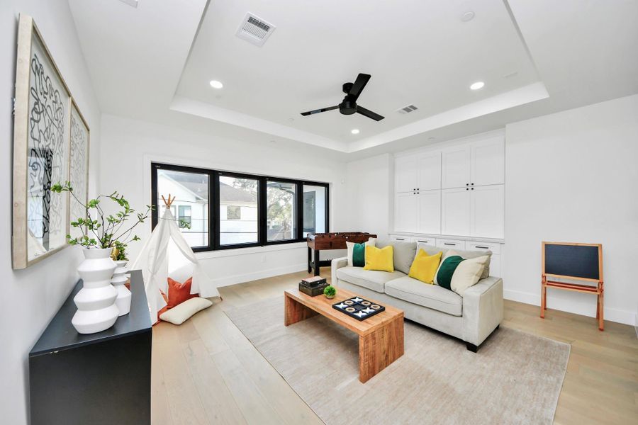 Step into the ultimate entertainment retreat, a large game room designed for both fun and sophistication.