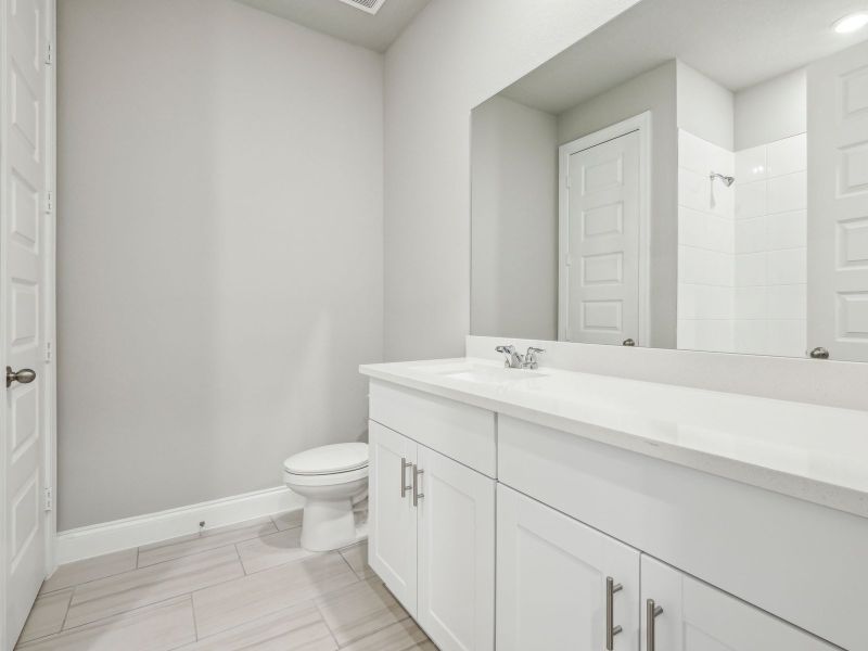 Furnished interior view inside a new home in Brystol at Wylder - Reserve Series, Port St. Lucie (Image 11).