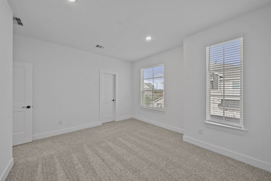 Spacious, unfurnished interior of a new home in Elyson Courtyard Collection, Katy (Image 14).