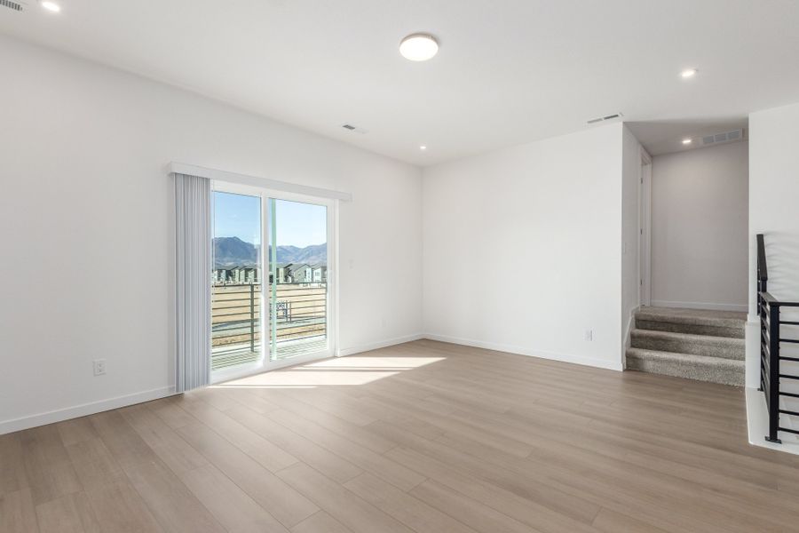 Spacious, unfurnished interior of a new home in Parkside at Victory Ridge, Colorado Springs (Image 29).