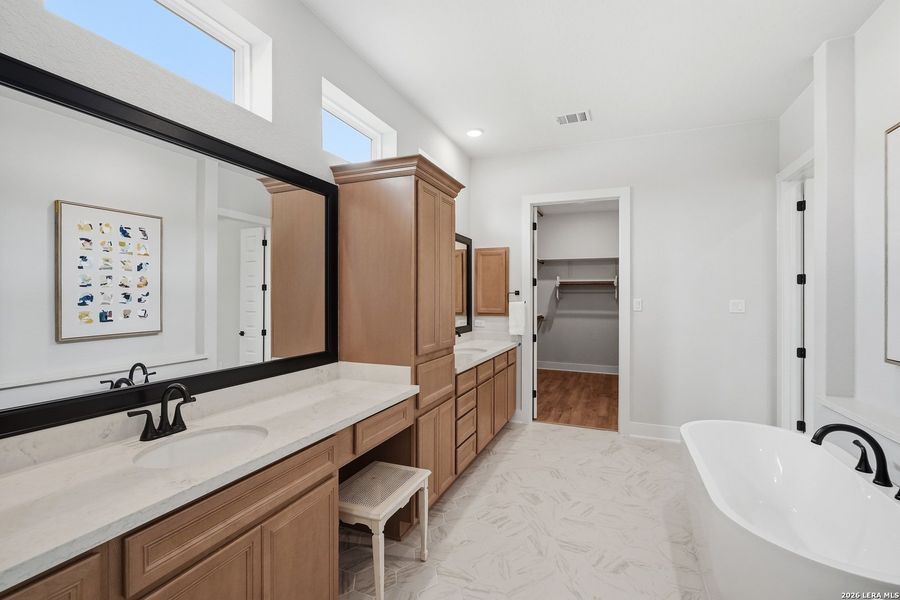 Furnished interior view inside a new home in Potranco Oaks, Castroville (Image 14).