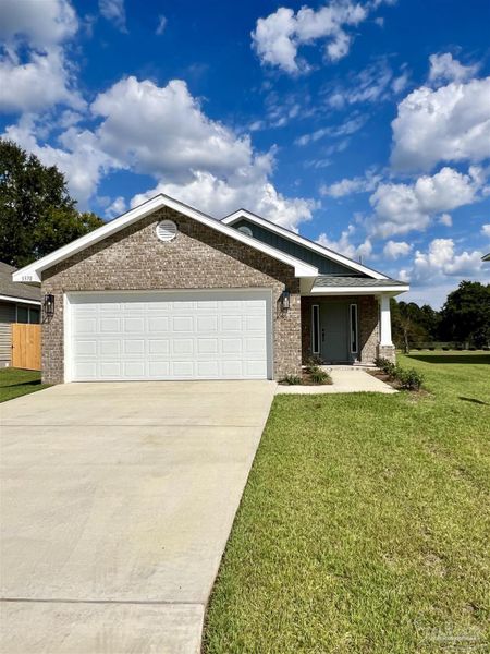 Front exterior of a new home in Allison Acres, Cantonment, FL, highlighting curb appeal (Image 1). Front exterior of a new home in Allison Acres, Cantonment, FL, highlighting curb appeal (Image 1).