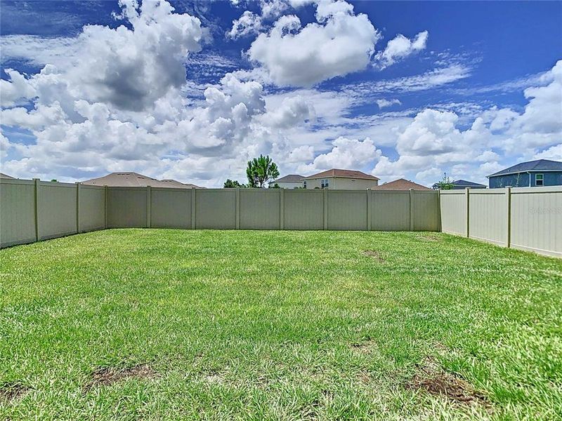 Front exterior of a new home in Pasadena Point, Wesley Chapel, FL, highlighting curb appeal (Image 24). Front exterior of a new home in Pasadena Point, Wesley Chapel, FL, highlighting curb appeal (Image 24).