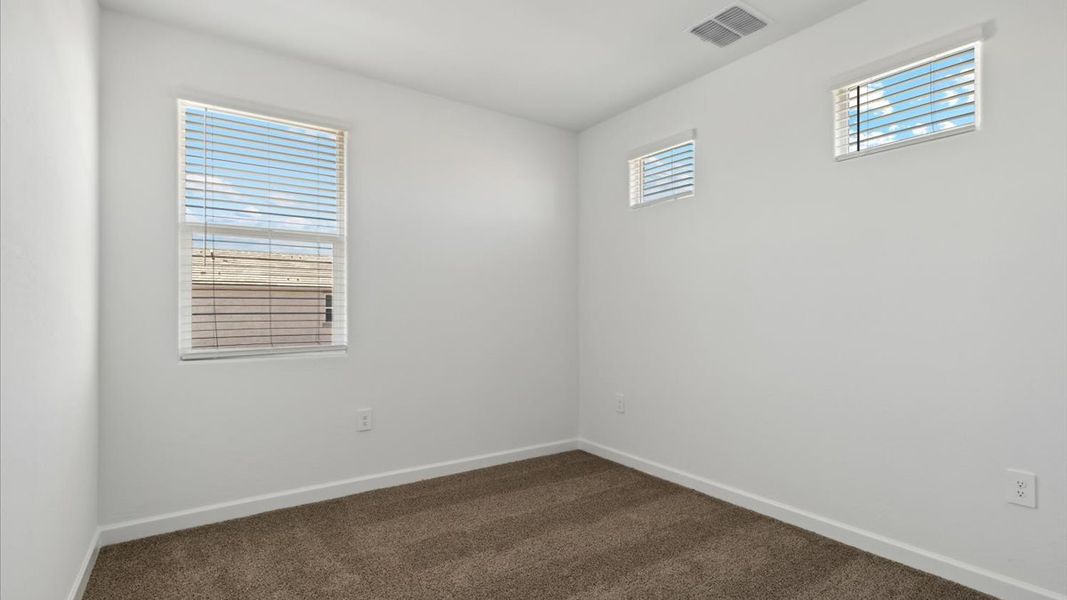 Spacious, unfurnished interior of a new home in Radiance at Superstition Vistas, Apache Junction (Image 30).