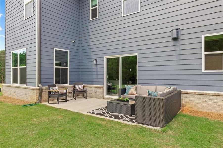 Front exterior of a new home in Oakhurst Manor, McDonough, GA, highlighting curb appeal (Image 2).