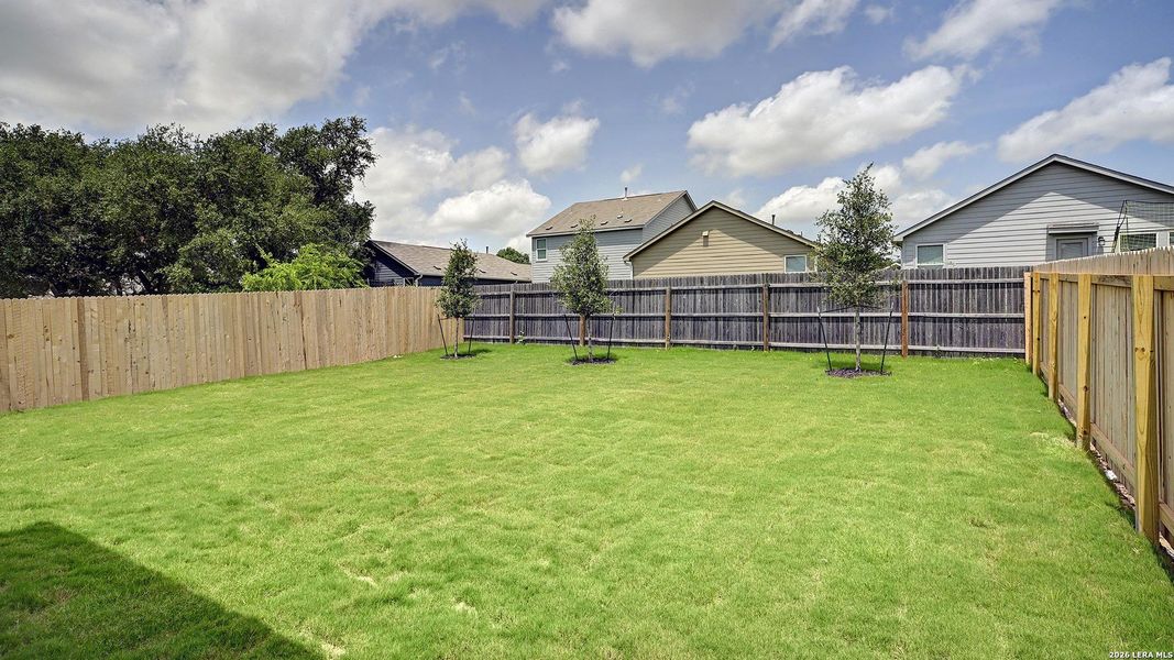 Exterior details and patio area of a home in Kallison Ranch, San Antonio (Image 26).