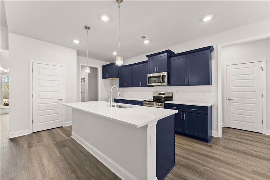 Representative furnished interior of a home built from the 2620 by Adams Homes in Williams Ridge, Bailey (Image 8). Representative furnished interior of a home built from the 2620 by Adams Homes in Williams Ridge, Bailey (Image 8).
