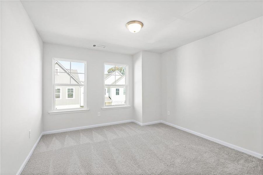 Spacious, unfurnished interior of a new home in The Village at Shallowford, Kennesaw (Image 22).