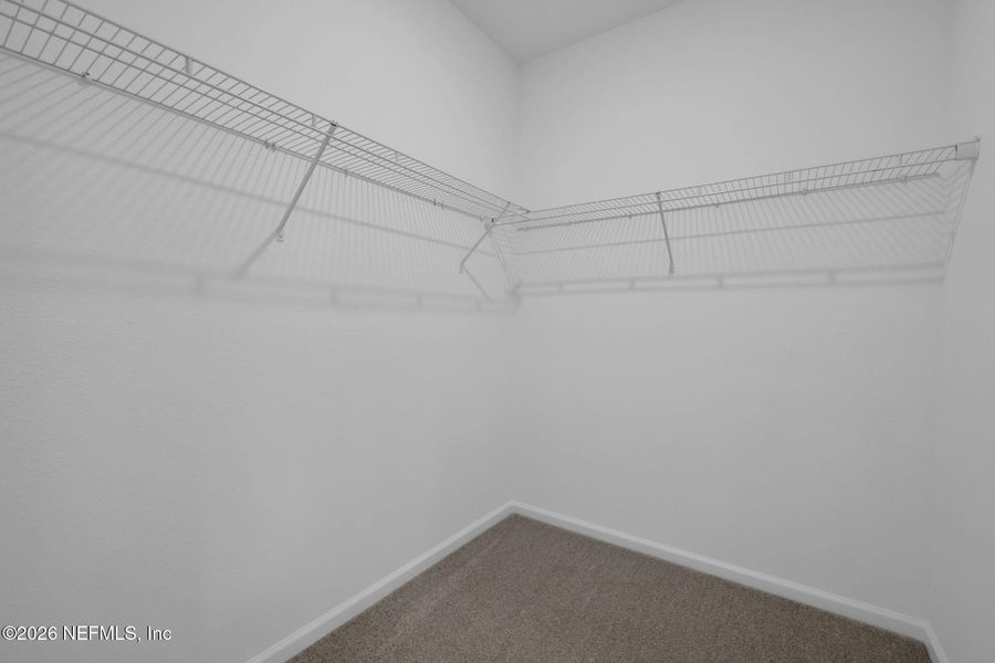 Spacious, unfurnished interior of a new home in Seminole Trace, Palm Coast (Image 27).