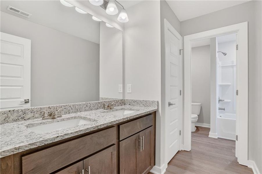 Furnished interior view inside a new home in The Fairways at Mirror Lake, Villa Rica (Image 13).