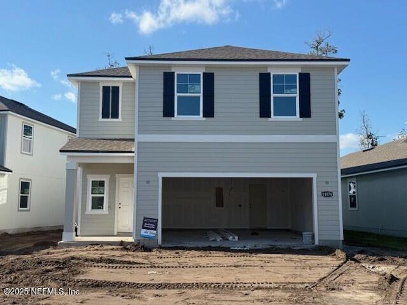 In-progress construction of a new home in Palm Series at The Landings at Pecan Park, Jacksonville, FL (Image 2).