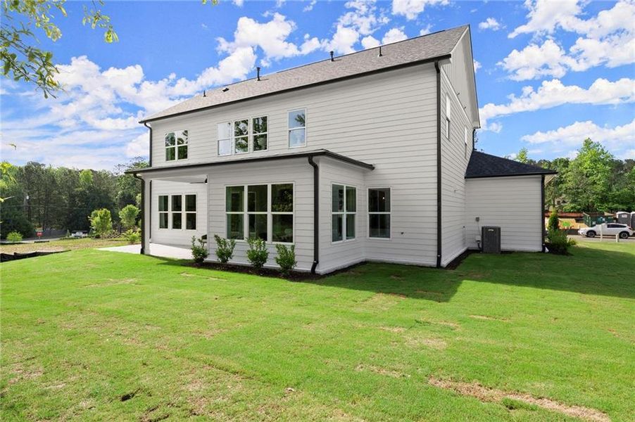 Exterior details and patio area of a home in Hillgrove Preserve, Powder Springs (Image 29).