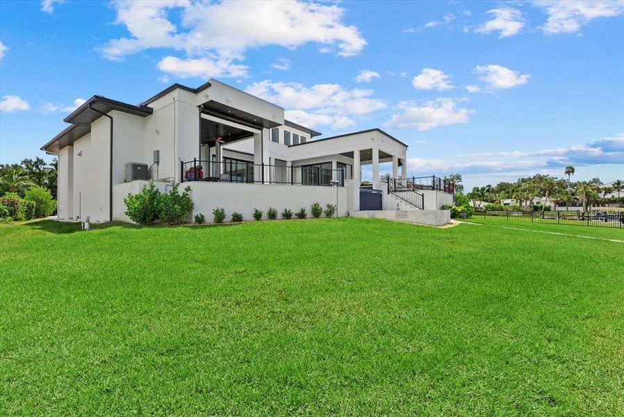 Front exterior of a new home in , Osprey, FL, highlighting curb appeal (Image 22).