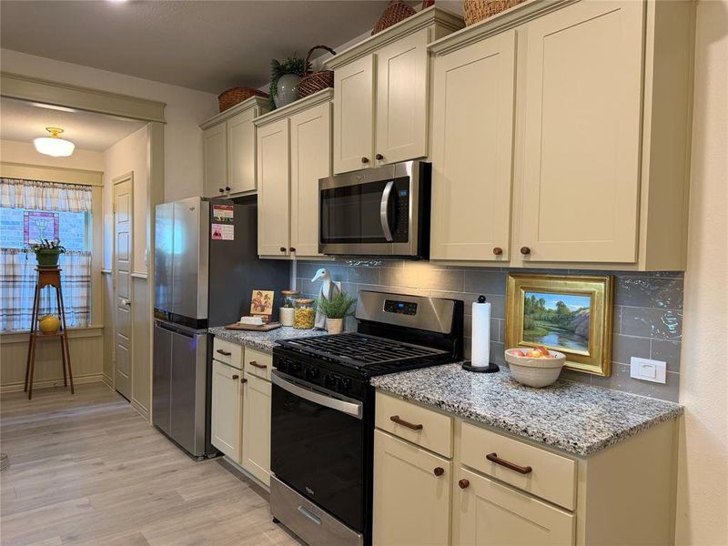 Preferred Gas Range. Beadboard in Laundry and Pantry Nook. Preferred Gas Range. Beadboard in Laundry and Pantry Nook.