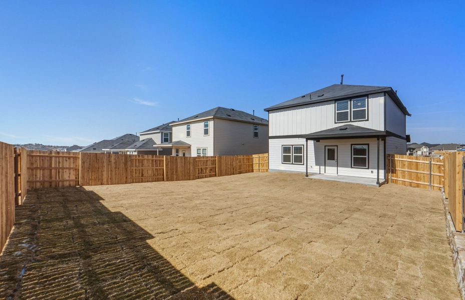 Exterior details and patio area of a home in Sunfield, Buda (Image 26).