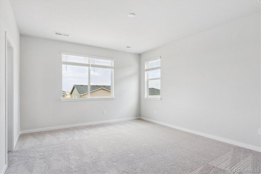 Spacious, unfurnished interior of a new home in Floret Collection at Alder Creek, Parker (Image 23).