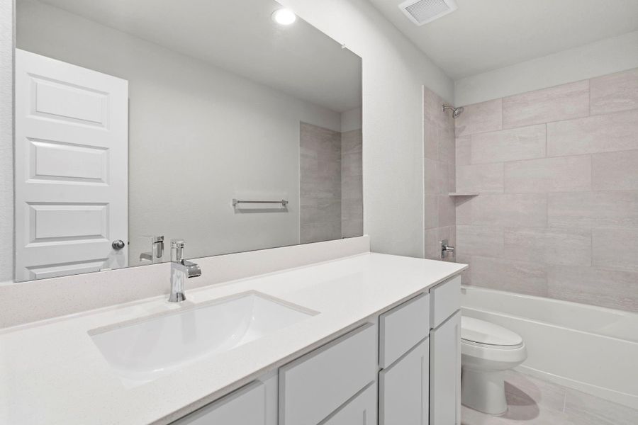 Furnished interior view inside a new home in Cypresswood Landing, Humble (Image 11).