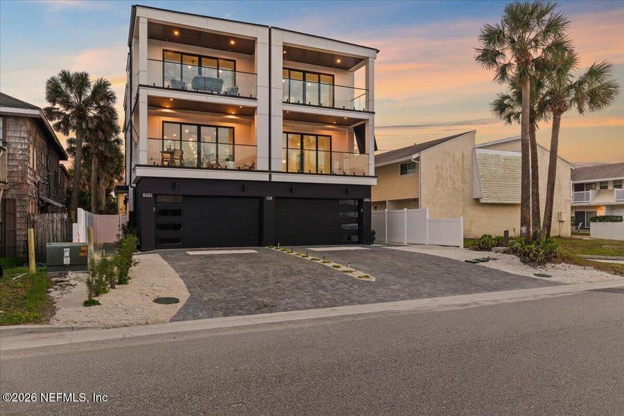 Front exterior of a new home in , Jacksonville Beach, FL, highlighting curb appeal (Image 34).