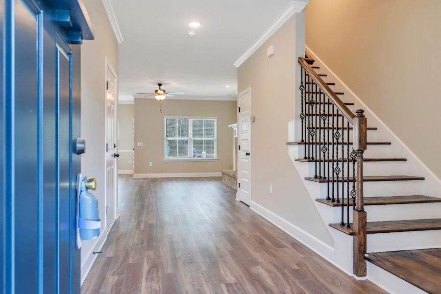 Seabrook Foyer with Oak and Iron Staircase