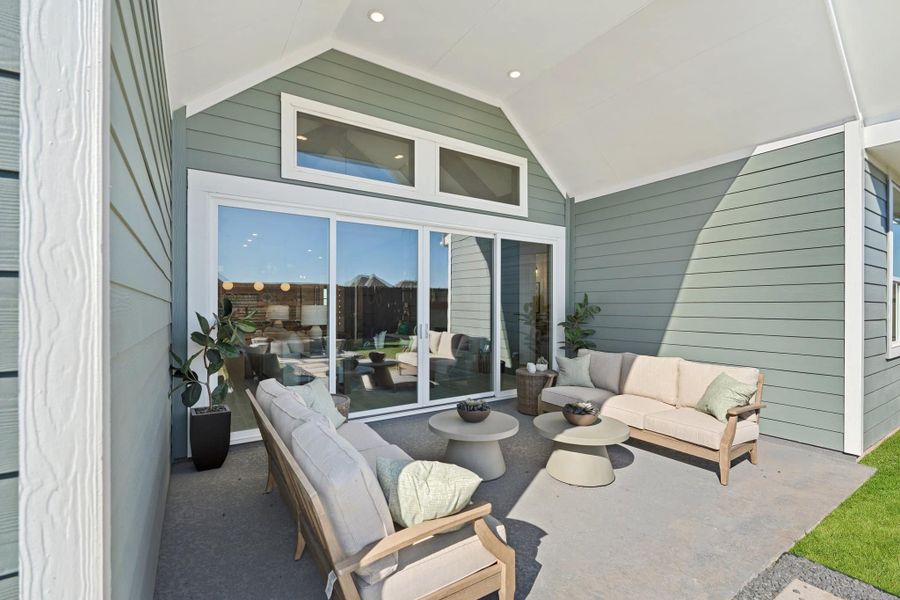 Exterior details and patio area of a home in Meridiana, Manvel (Image 3).