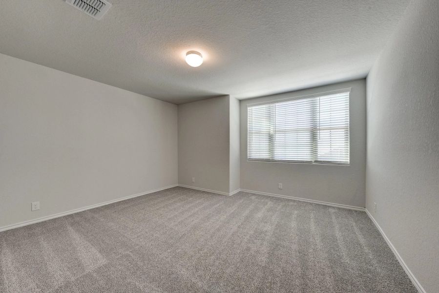 Representative unfurnished interior of a home built from the Devon by Ashton Woods in Cordova Trails, Seguin (Image 25).