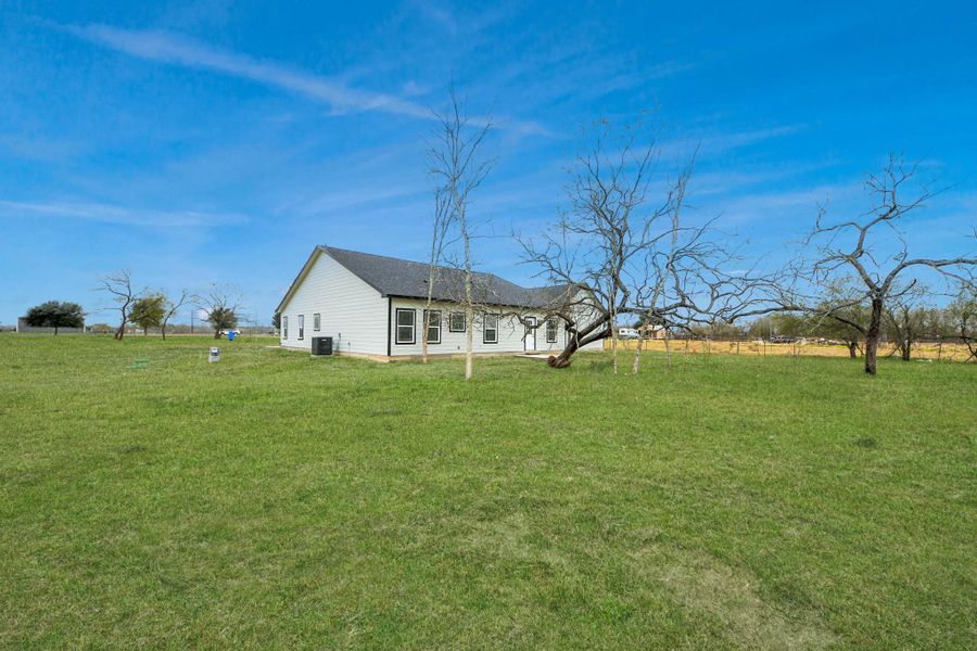 Exterior details and patio area of a home in , Brookshire (Image 3).