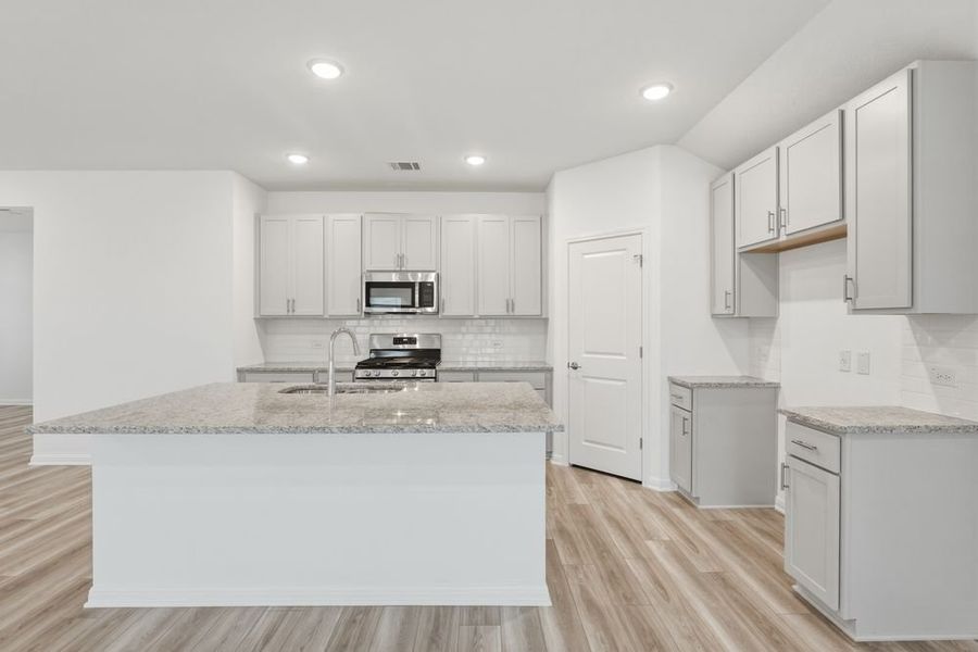Furnished interior view inside a new home in Emory Crossing, Hutto (Image 4).