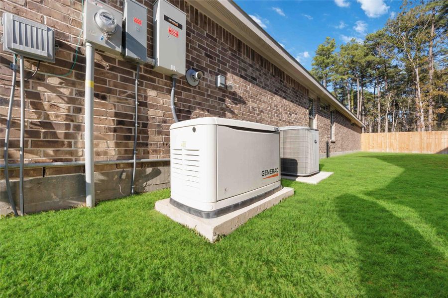 Whole-Home Generator & Utility AreaEquipped with a Generac whole-home generator, this property offers dependable backup power and added confidence during outages. Professionally installed and neatly positioned along the side of the home, this feature supports uninterrupted comfort and functionality—an increasingly valuable upgrade for today’s homeowner. Whole-Home Generator & Utility AreaEquipped with a Generac whole-home generator, this property offers dependable backup power and added confidence during outages. Professionally installed and neatly positioned along the side of the home, this feature supports uninterrupted comfort and functionality—an increasingly valuable upgrade for today’s homeowner.