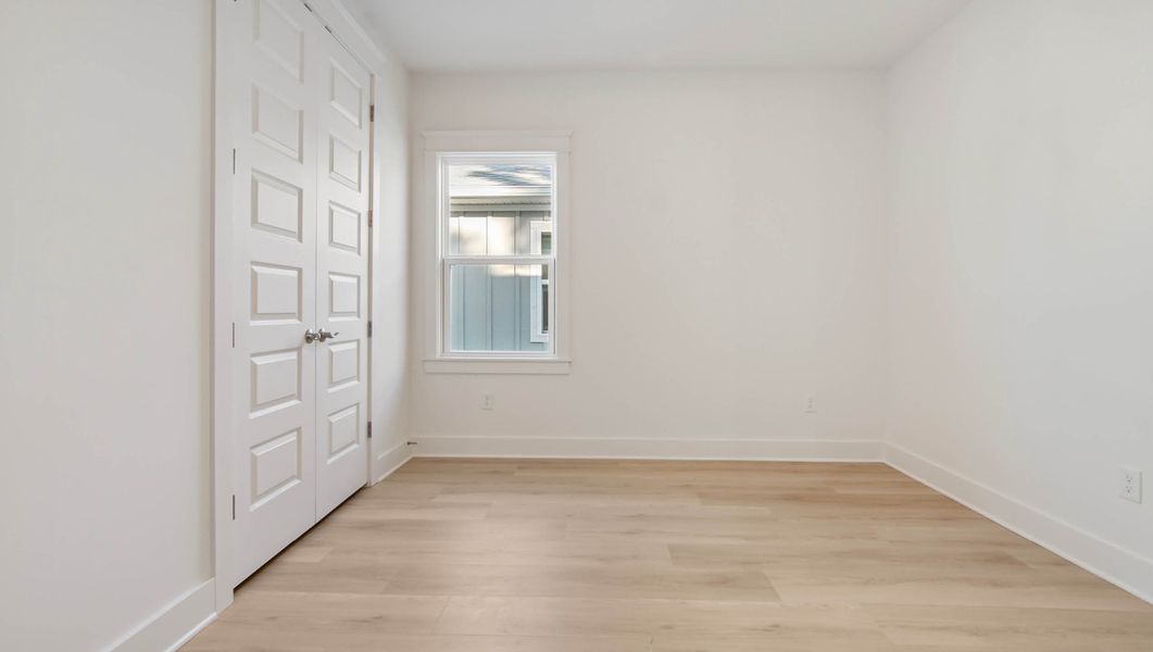 Representative unfurnished interior of a home built from the Ava by D.R. Horton in Parkside, Santa Rosa Beach (Image 43).