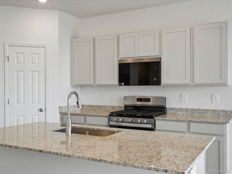 Furnished interior view inside a new home in Buffalo Highlands: The Canyon Collection, Commerce City (Image 5).