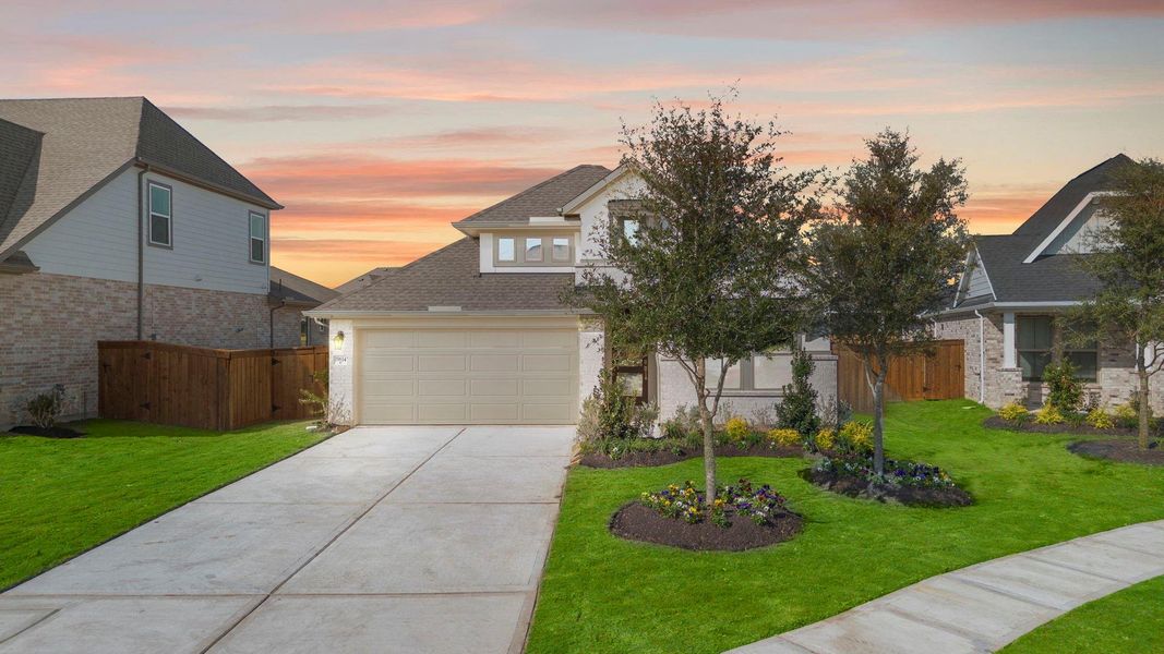 Front exterior of a new home in Dunham Pointe 50', Cypress, TX, highlighting curb appeal (Image 21).