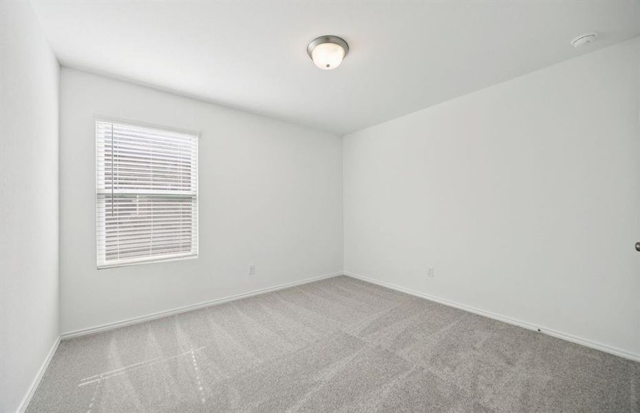 Inviting bedroom offering soft natural light Inviting bedroom offering soft natural light