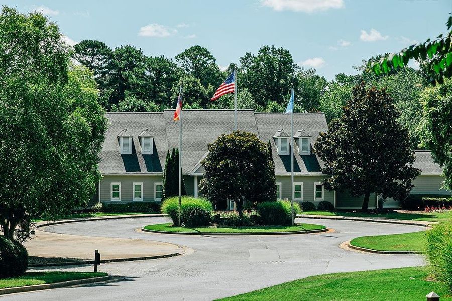 Front exterior of a new home in Pinecrest Ridge, Dacula, GA, highlighting curb appeal (Image 21).