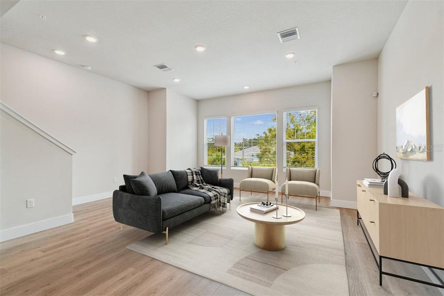 Furnished interior view inside a new home in Towns at Union, St. Petersburg (Image 14).