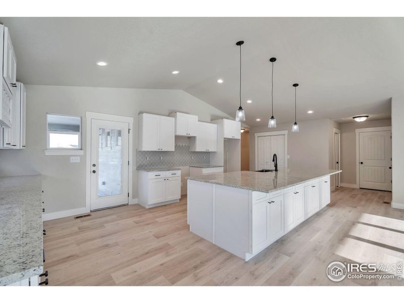 HUGE kitchen island! SS appliances coming soon!