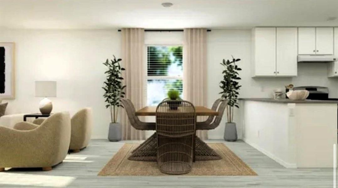 Dining area featuring light wood-style floors