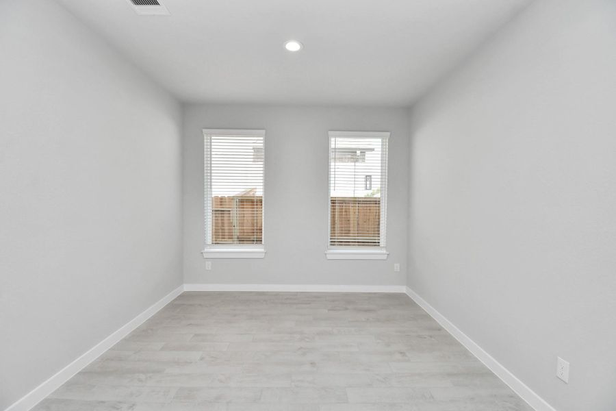 Create lasting memories with your family and friends at the dining table! This expansive dining room showcases sophisticated flooring, custom paint, and seamlessly connects to the family room and kitchen, providing an open and inviting atmosphere. Create lasting memories with your family and friends at the dining table! This expansive dining room showcases sophisticated flooring, custom paint, and seamlessly connects to the family room and kitchen, providing an open and inviting atmosphere.