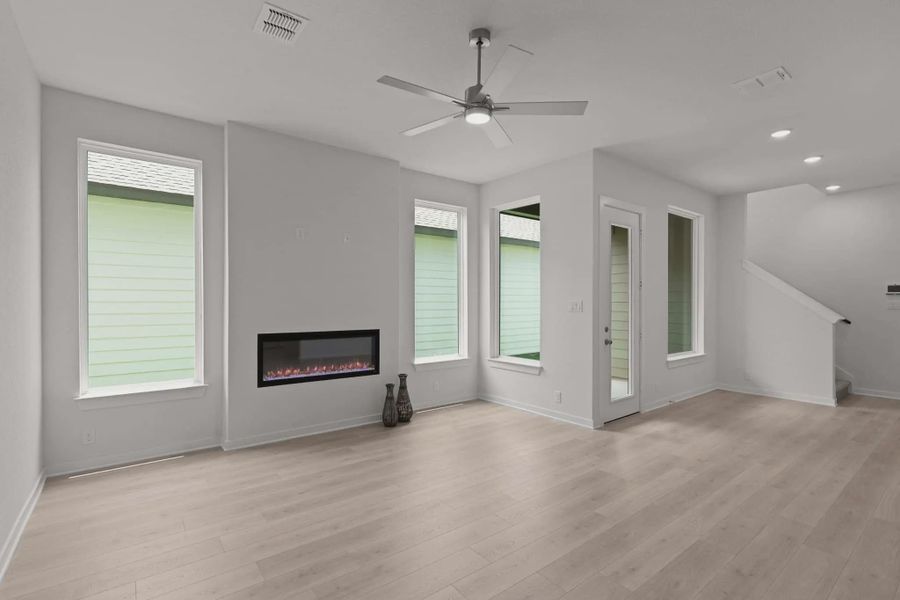 Representative unfurnished interior of a home built from the Tanner by Chesmar Homes in The Crossvine, Forney (Image 10).