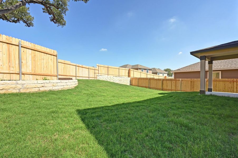 Exterior details and patio area of a home in Creekside at Estancia, Austin (Image 4).