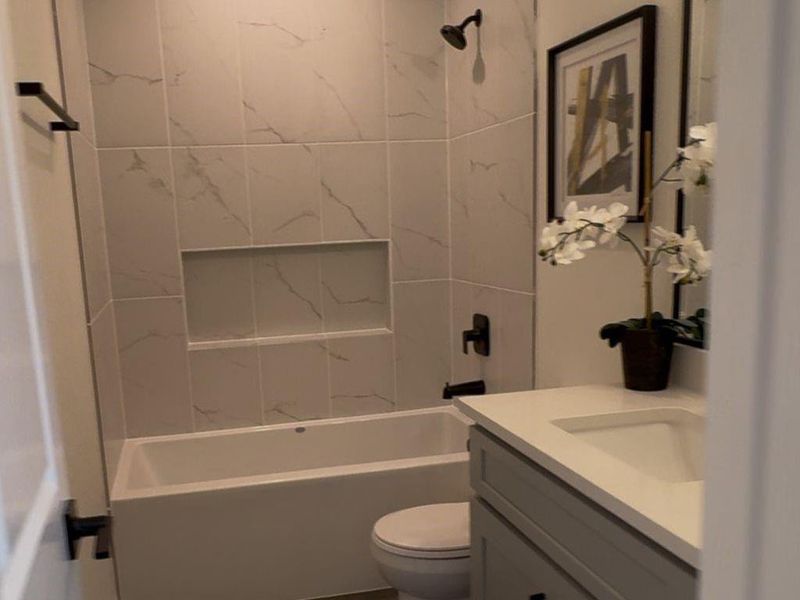 Furnished interior view inside a new home in Spring Branch Crossing, Conroe (Image 5).