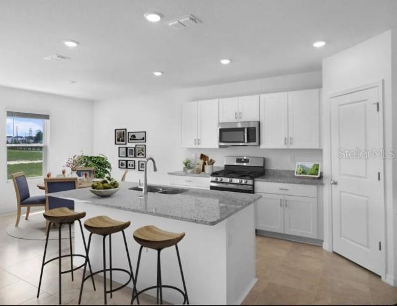 Furnished interior view inside a new home in Waterstone, Groveland (Image 8). Furnished interior view inside a new home in Waterstone, Groveland (Image 8).
