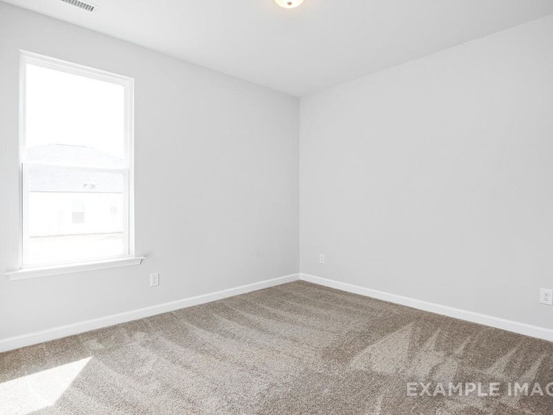 Spacious, unfurnished interior of a new home in Woodland Crossing, Zebulon (Image 11).