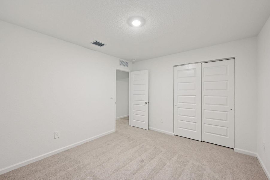 Spacious, unfurnished interior of a new home in Meritage Homes at Terra Lago - Premier Series, Indiantown (Image 17).