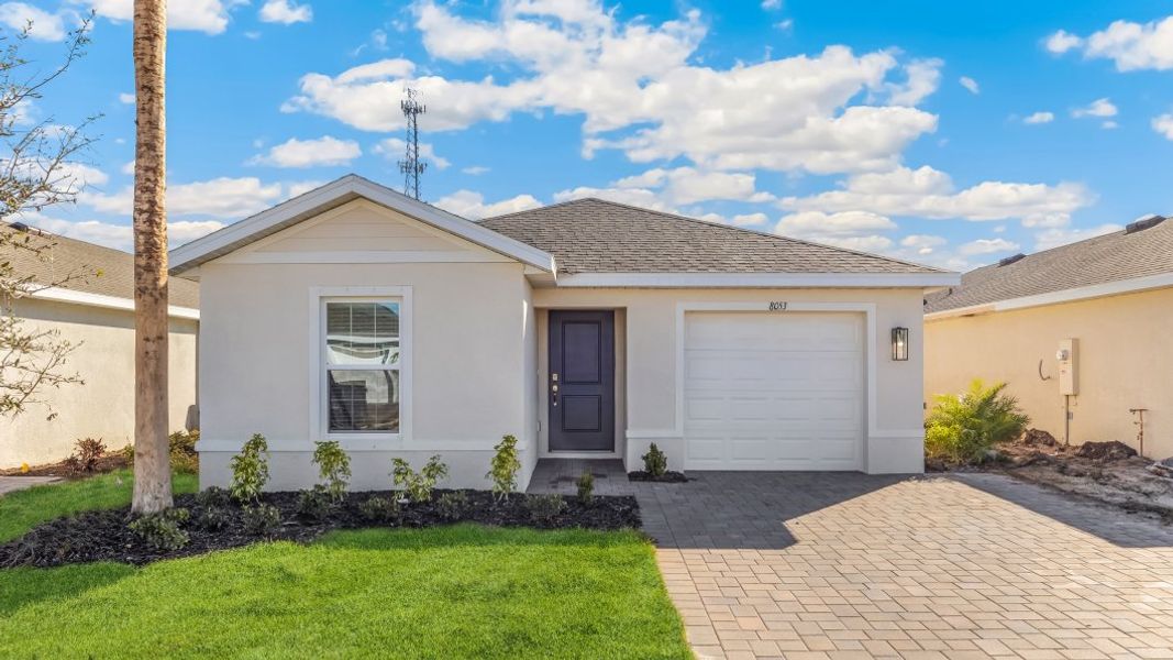 Front exterior of a new home in Asher Park, Lehigh Acres, FL, highlighting curb appeal (Image 1). Front exterior of a new home in Asher Park, Lehigh Acres, FL, highlighting curb appeal (Image 1).