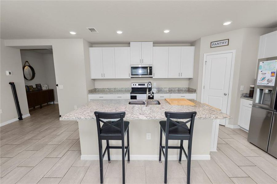 Furnished interior view inside a new home in The Reserve at Van Oaks, Auburndale (Image 11). Furnished interior view inside a new home in The Reserve at Van Oaks, Auburndale (Image 11).