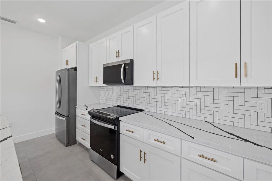 Furnished interior view inside a new home in , Punta Gorda (Image 2). Furnished interior view inside a new home in , Punta Gorda (Image 2).