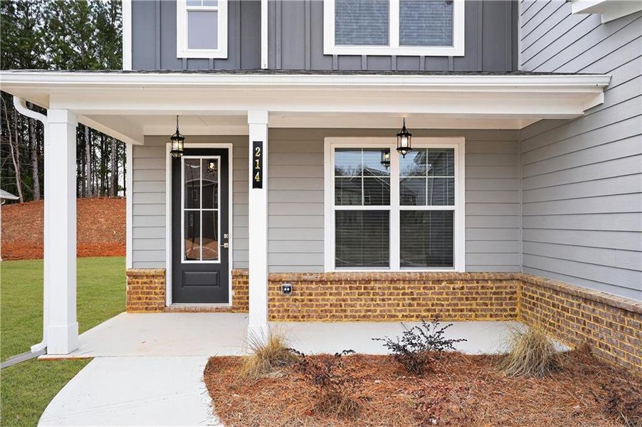 Exterior details and patio area of a home in The Fairways at Mirror Lake, Villa Rica (Image 3).